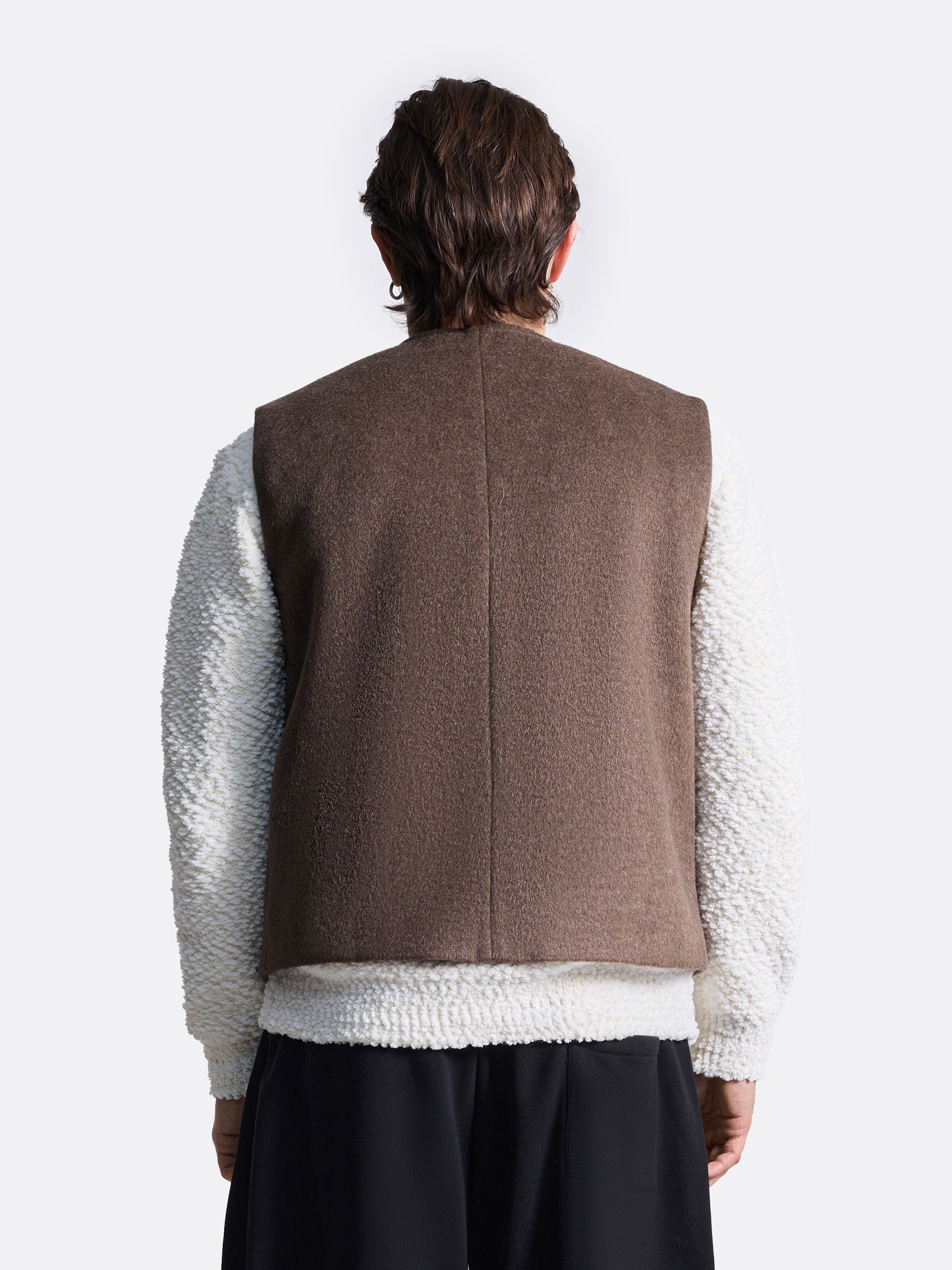 Жилет на пуговицах