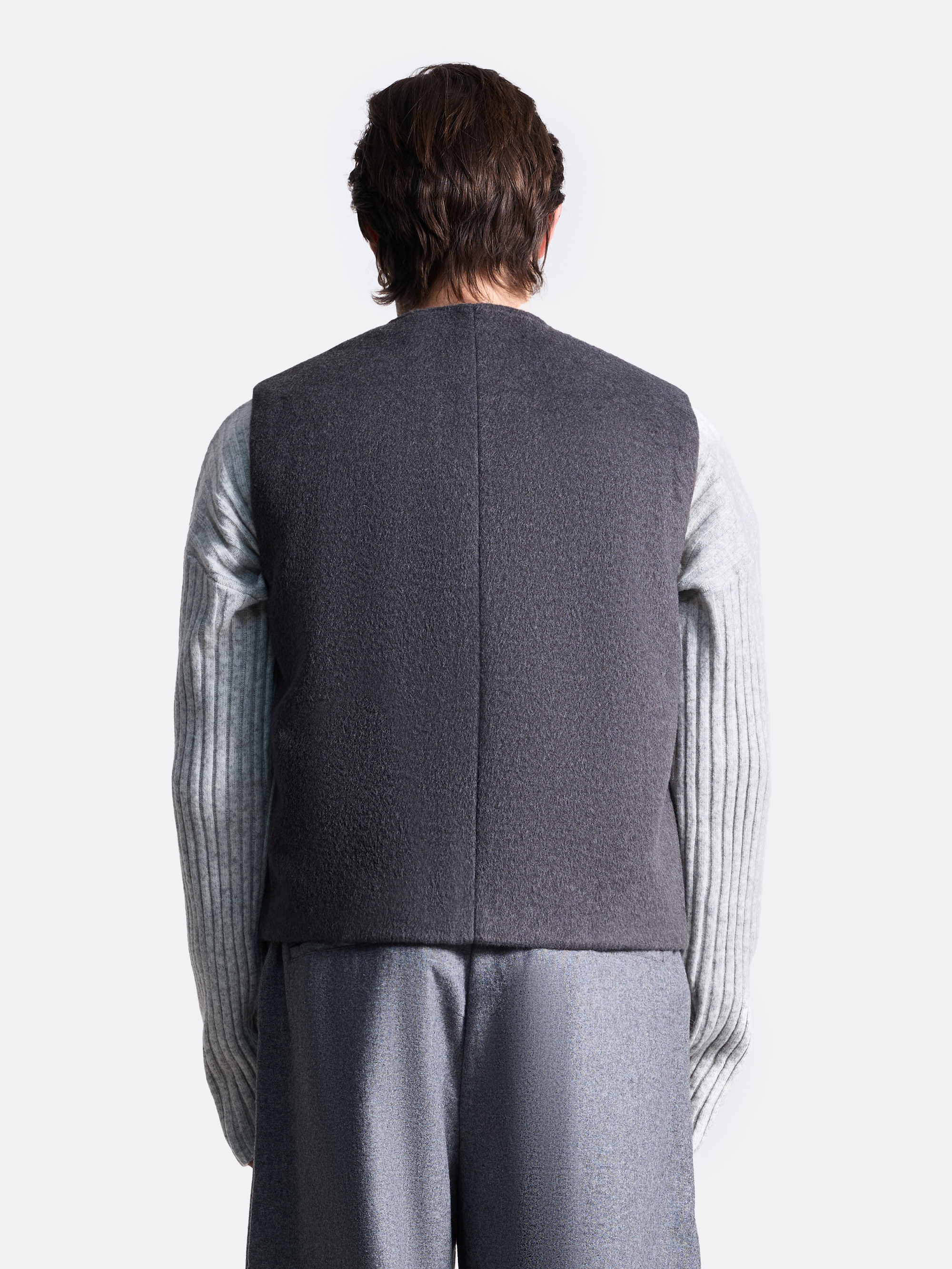 Жилет на пуговицах